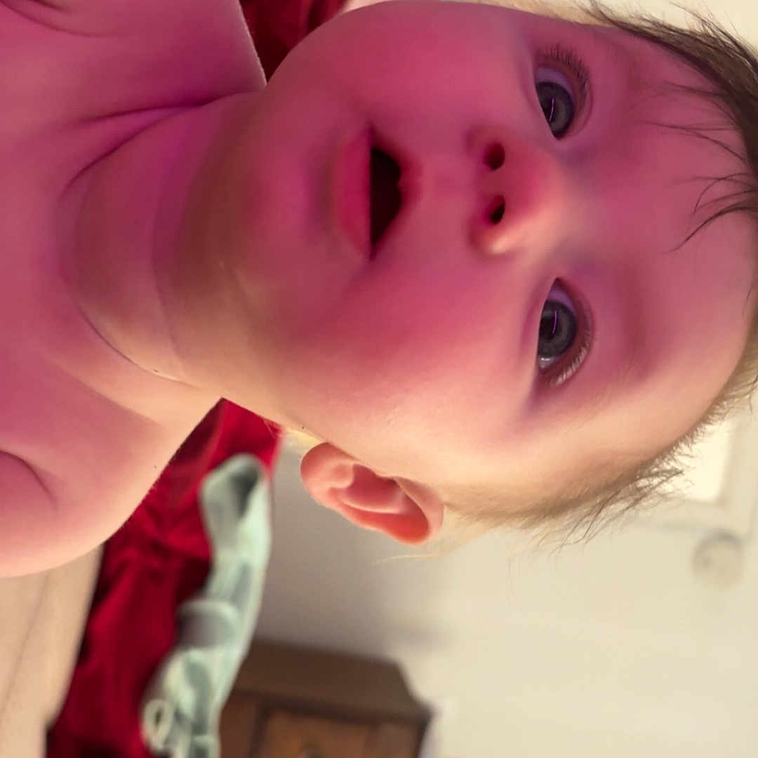 Nova joined the competition — help win amazing prizes! baby, bedroom, blanket, candid, child, closeup, curious, ear, expression, eyes, face, furniture, indoors, infant, mouth, person, portrait, skin, soft, wood