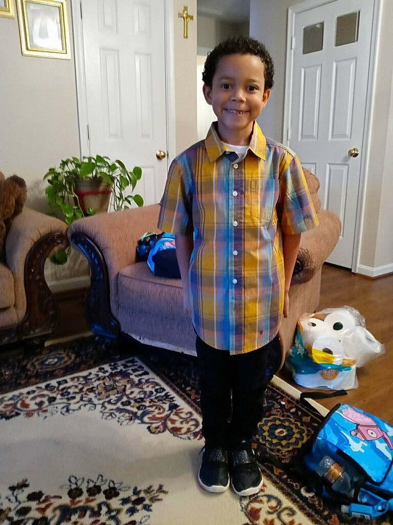 Keagan joined the competition — help win amazing prizes! blue, child, door, eyewear, floor, flooring, happy, houseplant, joy, leisure, person, picture_frame, plaid, plant, sleeve, smile, t_shirt, tartan, textile, tie