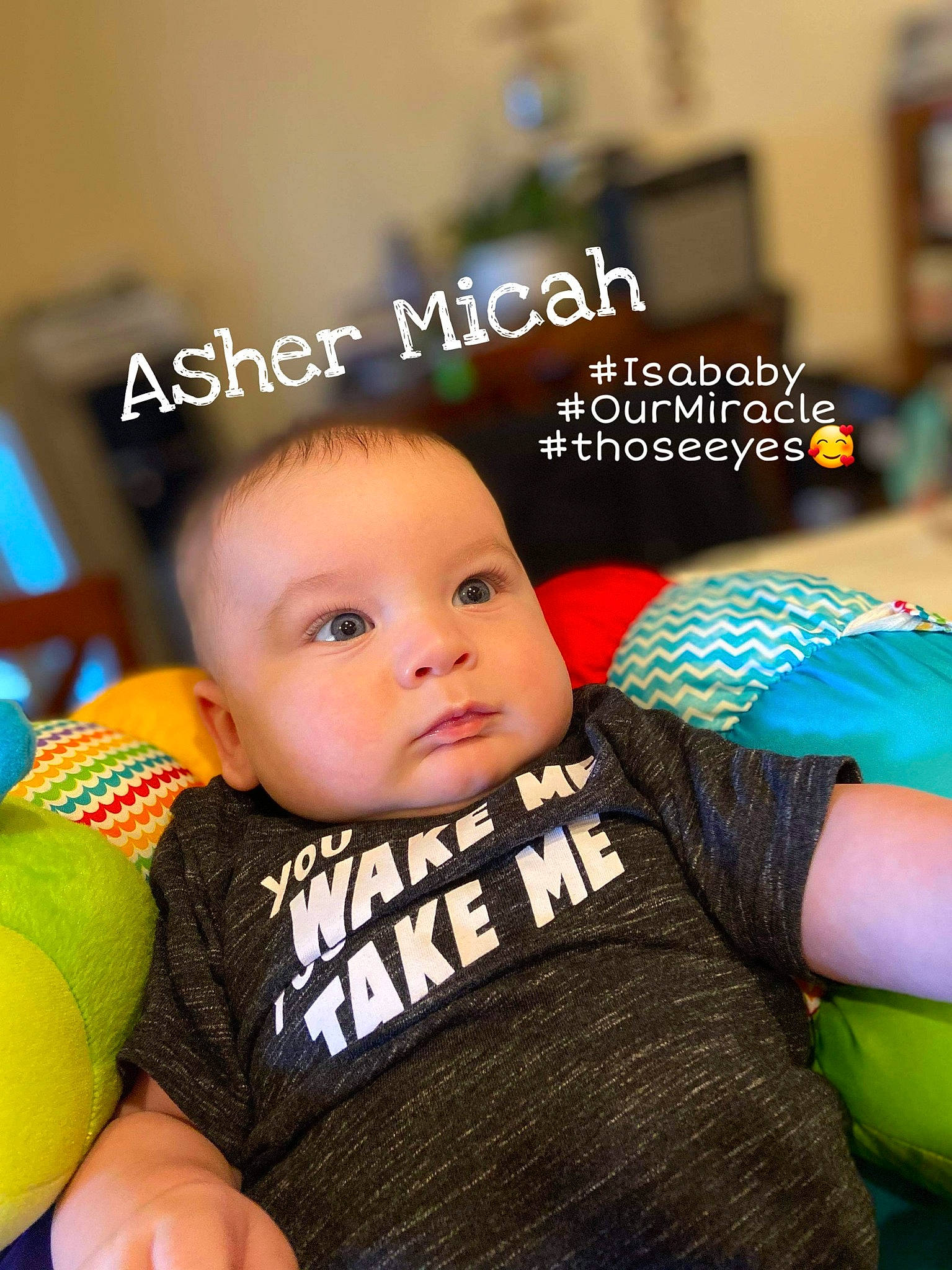 Asher joined the competition — help win amazing prizes! baby, baby_products, baby_toddler_clothing, chair, cheek, child, couch, facial_expression, finger, fun, green, happy, leisure, person, photo_caption, play, sitting, skin, t_shirt, toddler