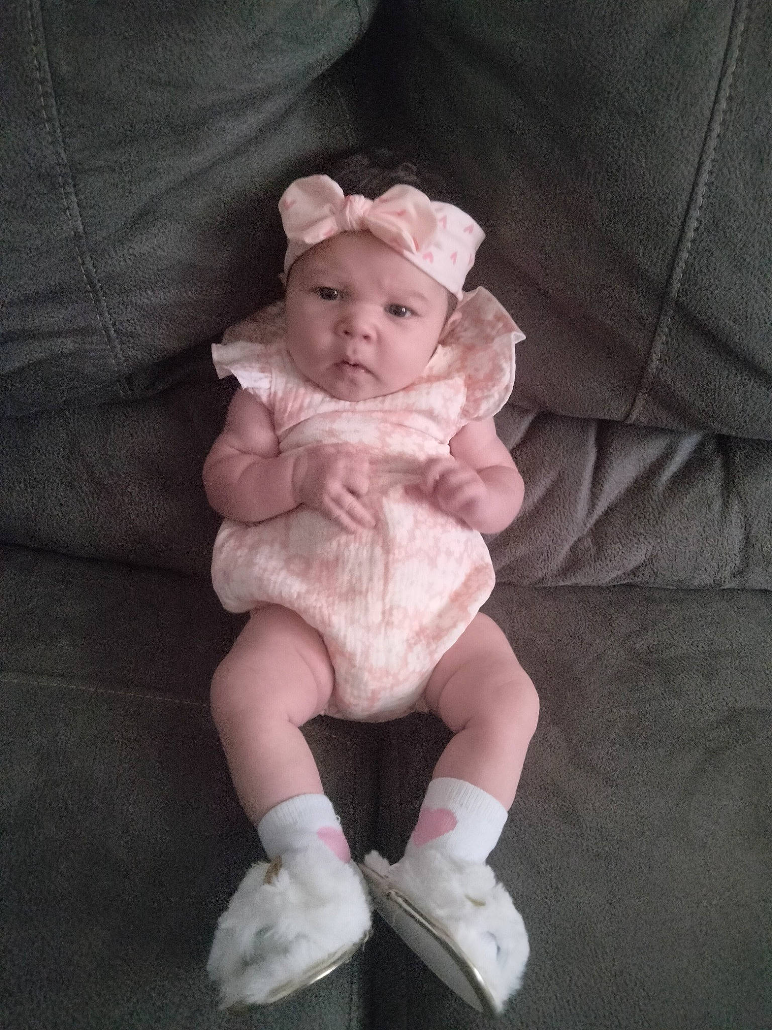 Scarlett Ann-marie Parker is registered to the contest to win money with this photo: baby, baby_products, baby_toddler_clothing, cheek, child, collar, comfort, dress, fashion_accessory, foot, headwear, human_leg, pattern, peach, person, sitting, sleeve, sock, thumb, toddler