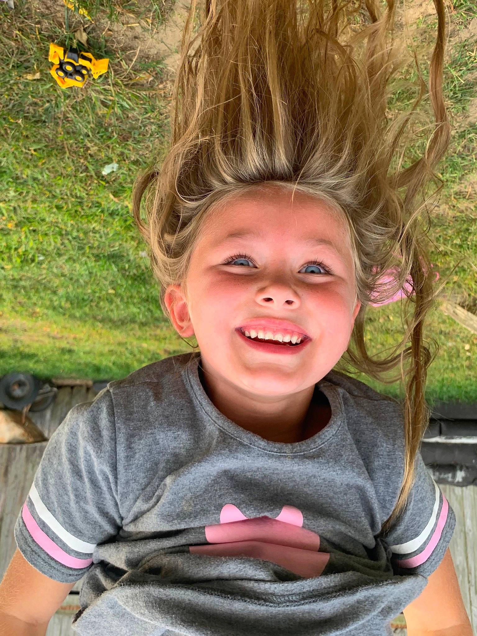Ezmae joined the competition — help win amazing prizes! blond, child, child_model, cool, face, facial_expression, fawn, fun, gesture, grass, hair, hairstyle, happy, head, joy, laugh, nose, person, smile, toddler