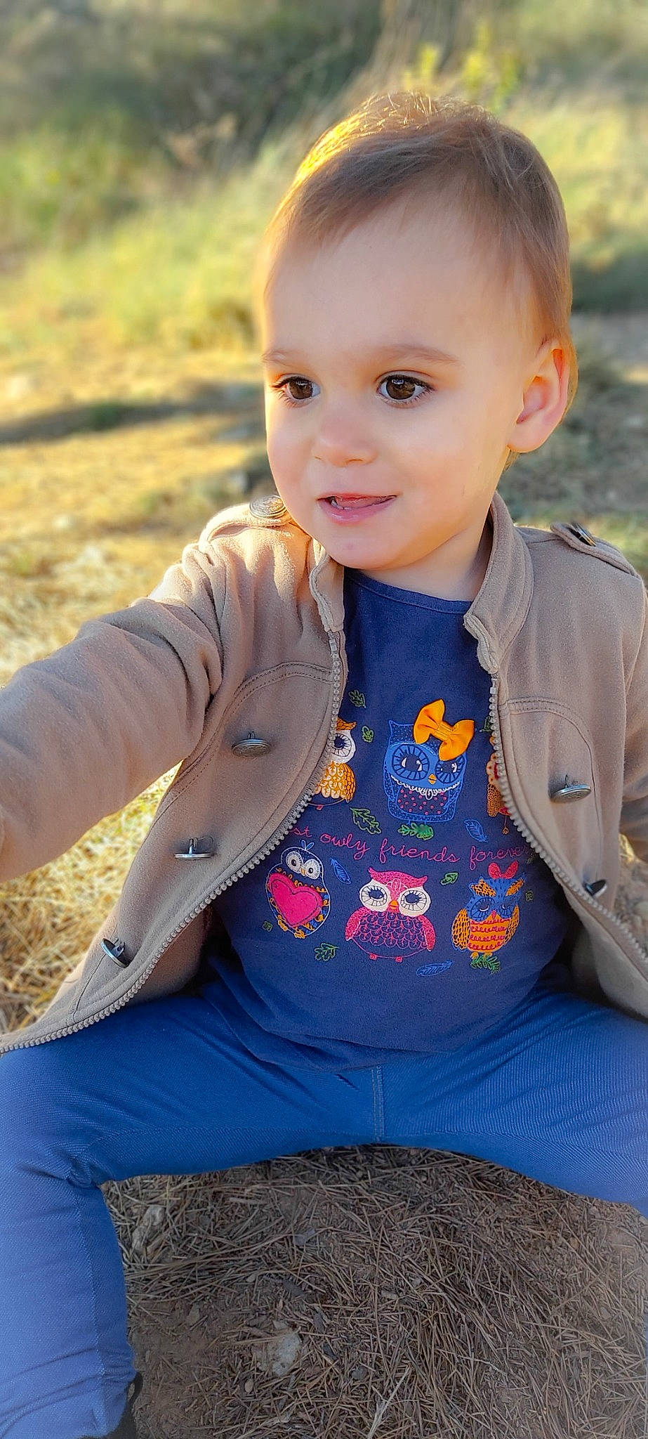 Myla participe au concours pour gagner de l'argent avec cette photo : baby_toddler_clothing, beauty, dress, eye, face, flash_photography, grass, hair, happy, head, iris, lip, outerwear, people, people_in_nature, person, skin, sleeve, smile, toddler