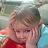 Allie Jo joined the competition — help win amazing prizes! blond_hair, blue_eyes, cheeks, child, close_up, cozy, face, hands, home, indoor, looking_at_camera, playful, portrait, red_shirt, seated, soft_focus, sunlight, toddler, turquoise_clothing, window