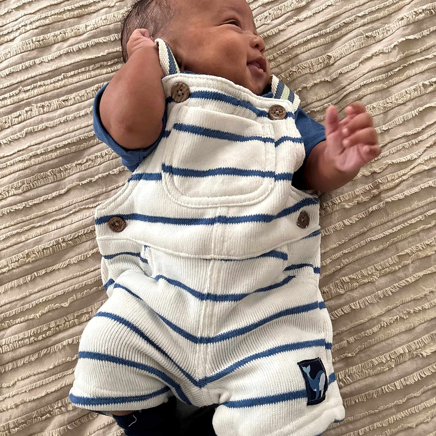 Tre is registered to the contest to win money with this photo: baby, bodypart, clothing, coat, face, finger, hand, happy, head, jacket, jeans, newborn, pants, person, photography, portrait, shirt, shorts, sleeping, yawning