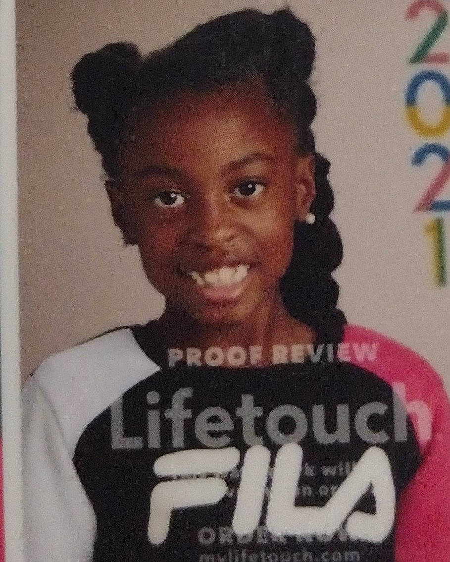 Ari Anna is registered to the contest to win money with this photo: black_hair, cheek, child, chin, cool, eyebrow, eyelash, font, forehead, fun, hair_coloring, happy, jheri_curl, joy, person, photo_caption, publication, selfie, sleeve, smile