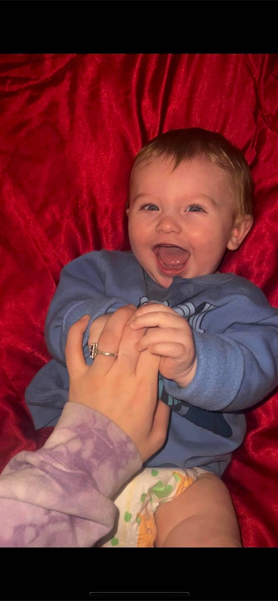 Azaiah joined the competition — help win amazing prizes! arm, baby, baby_toddler_clothing, cheek, comfort, eyebrow, finger, gesture, hand, happy, human_body, iris, lip, mouth, nose, person, skin, sleeve, smile, thumb