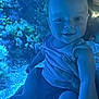 baby, child, smile, blue_light, aquarium, coral, underwater, hand, person, tank, marine_life, infant, holding, cute, portrait, indoor, sea_creatures, happy, young_child, human