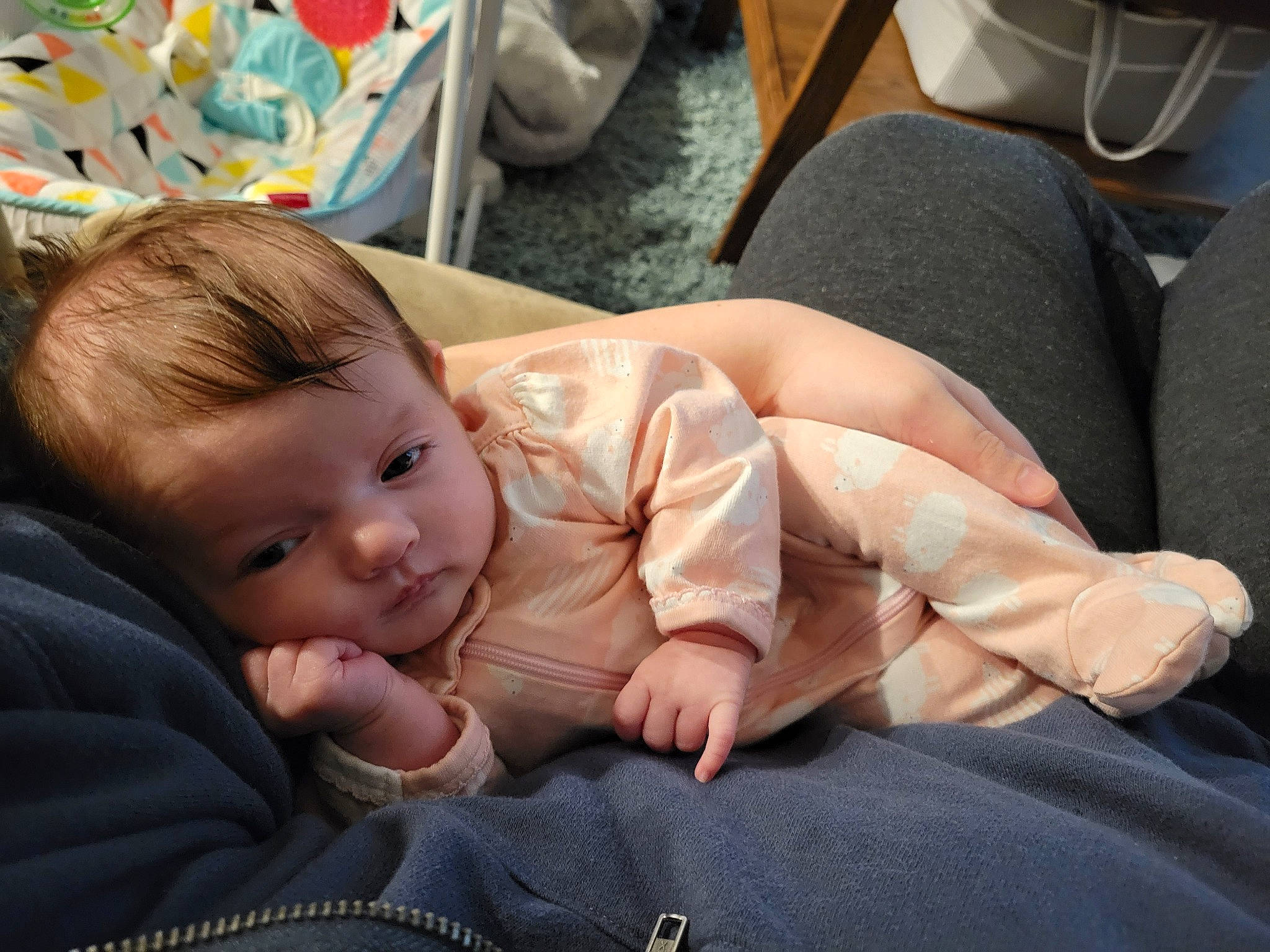 Maia joined the competition — help win amazing prizes! baby, baby_toddler_clothing, chair, cheek, child, comfort, flooring, fun, head, human_leg, knee, lap, mammal, person, room, sitting, skin, thigh, thumb, toddler