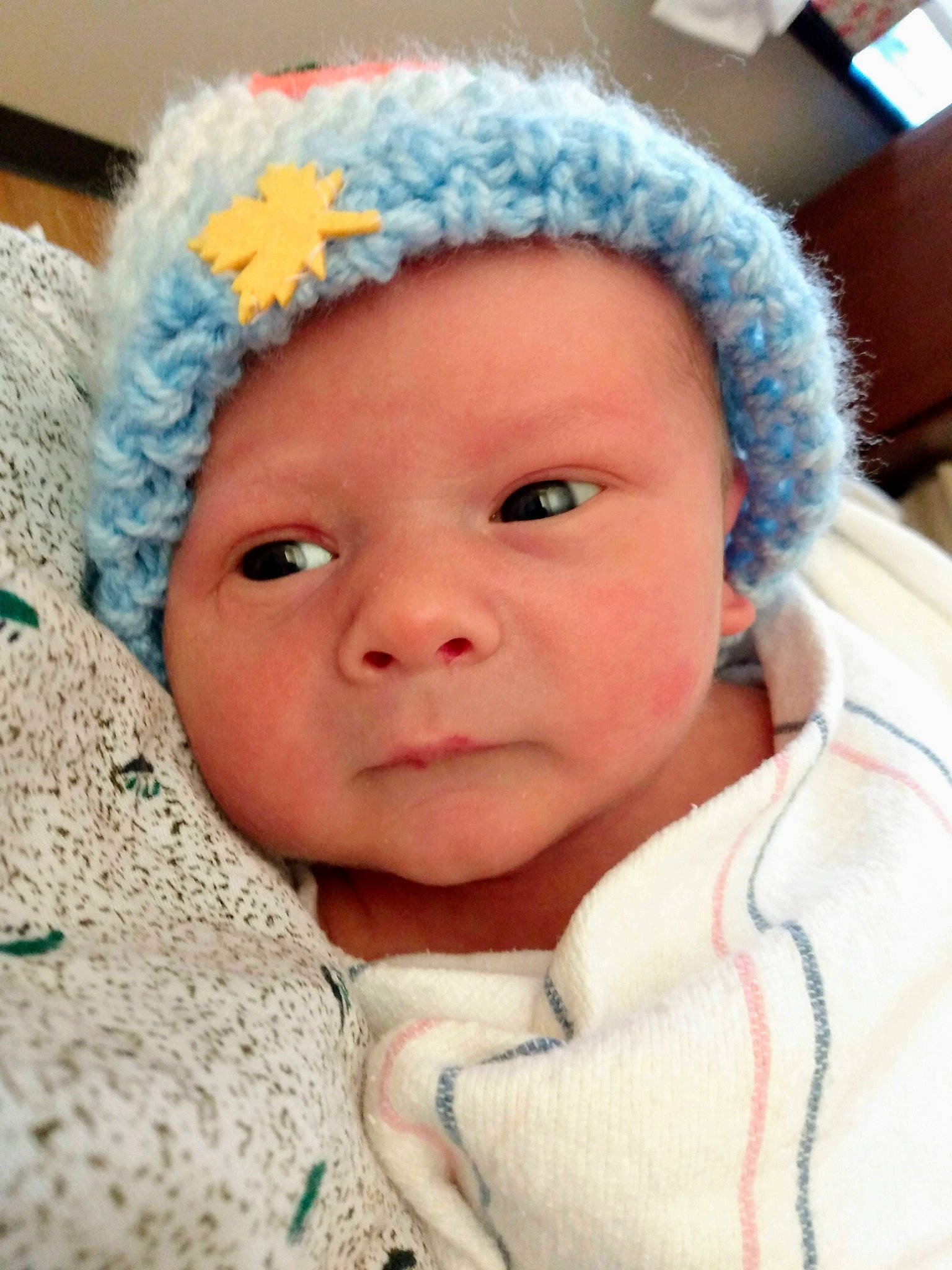 Jaxon is registered to the contest to win money with this photo: baby, baby_toddler_clothing, cap, cheek, child, chin, ear, eye, eyebrow, finger, happy, headwear, human_body, iris, knit_cap, lip, nose, outerwear, person, skin