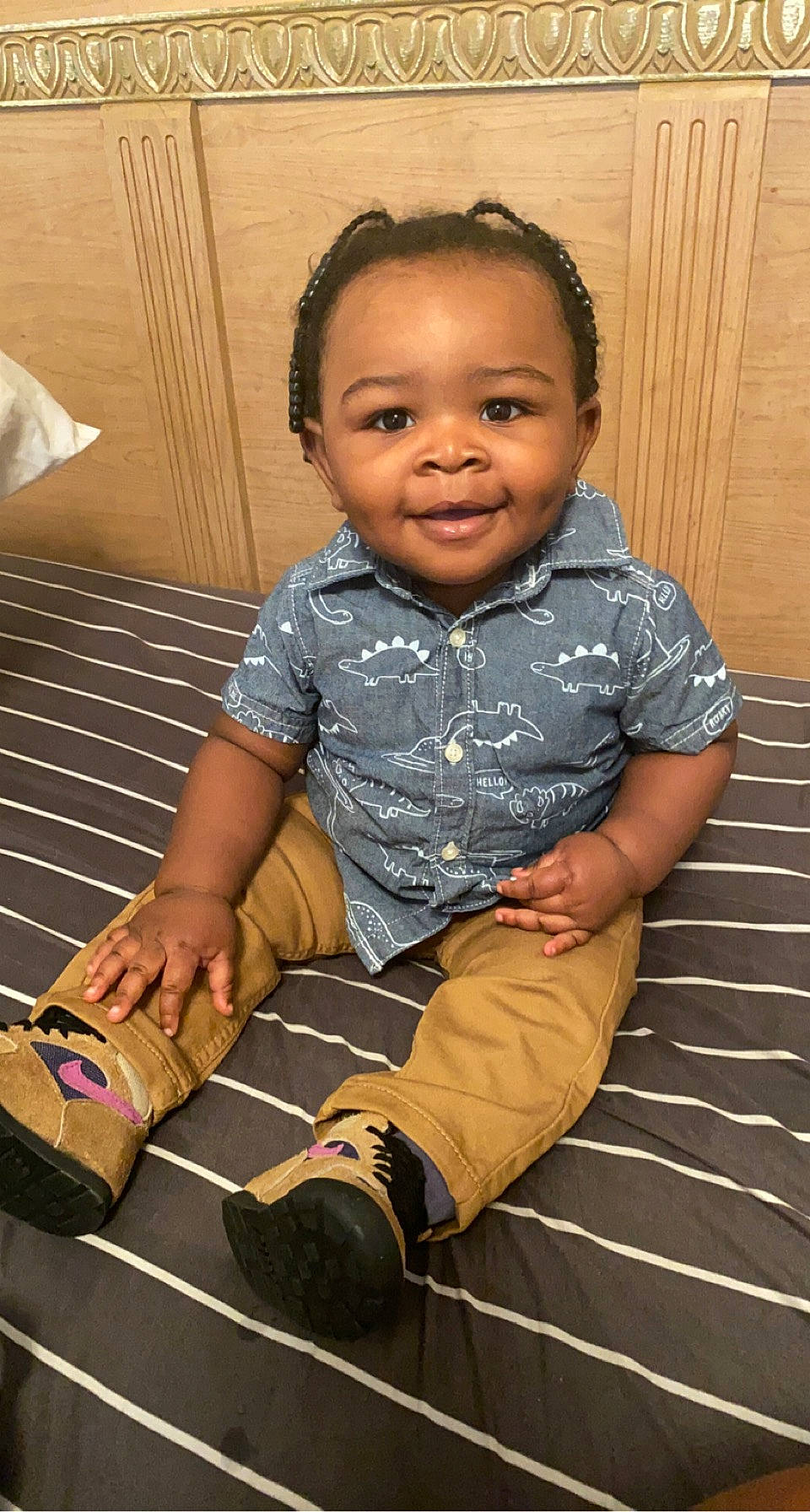 Kason is registered to the contest to win money with this photo: baby_toddler_clothing, cheek, child, cool, face, finger, flash_photography, flooring, fun, hair, happy, head, joy, person, sitting, skin, sleeve, smile, sneakers, thigh