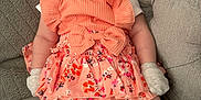Darcey joined the competition — help win amazing prizes! adorable, baby, child, closed_eyes, comfortable, couch, cozy, cute, gray_cushion, hat, indoor, infant, peach_dress, portrait, relaxed, sitting, sleeping, smile, soft_fabric, white_socks