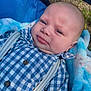 Hudson joined the competition — help win amazing prizes! accessories, baby, blanket, clothing, coat, cushion, face, frown, furniture, head, jacket, newborn, pants, person, photography, portrait, quilt, sad, shirt, sleeping
