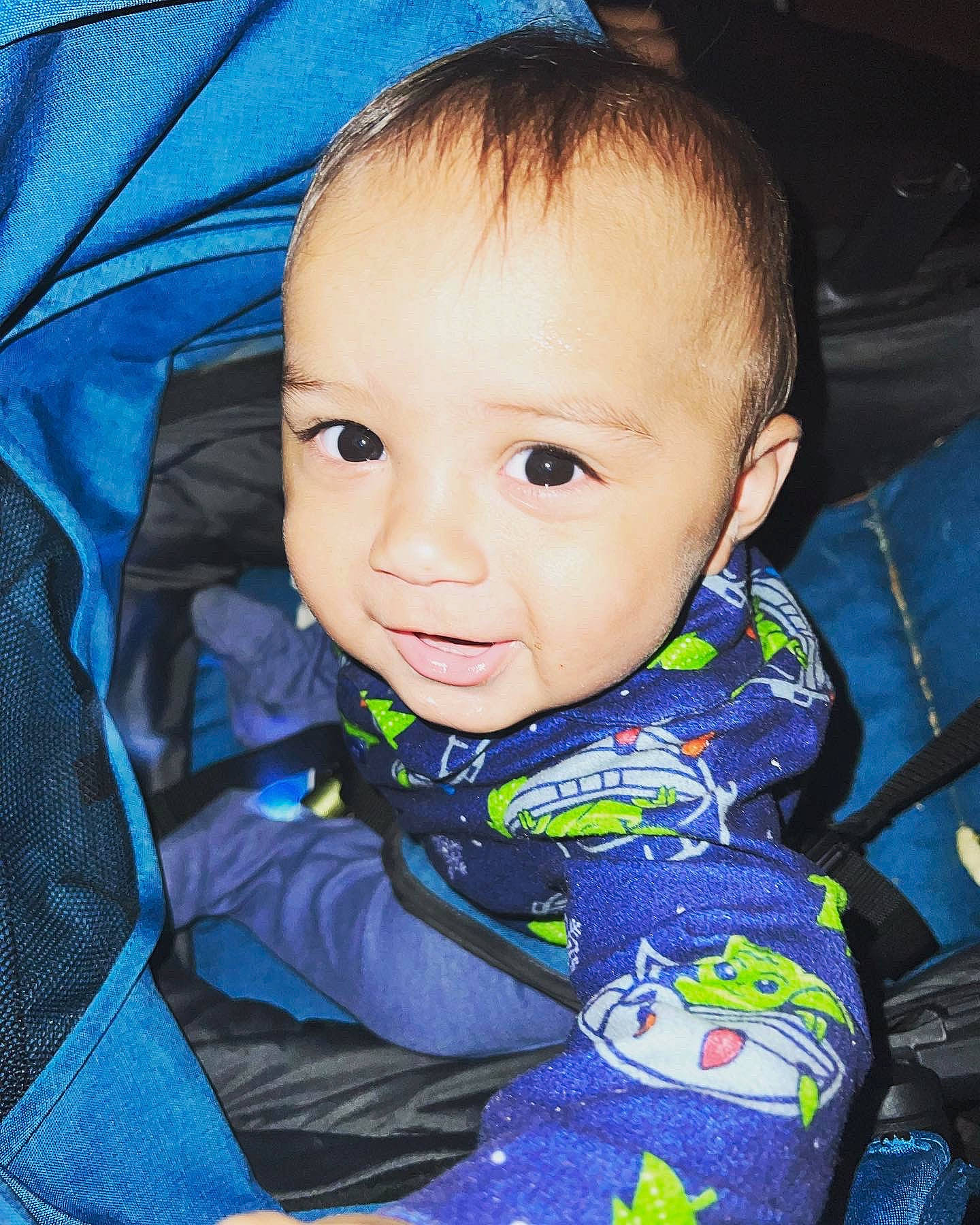 Kane is registered to the contest to win money with this photo: baby, baby_products, baby_toddler_clothing, blue, cheek, child, chin, comfort, electric_blue, eyebrow, eyelash, flash_photography, fun, happy, iris, person, sitting, sleeve, smile, toddler