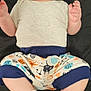Eyden is registered to the contest to win money with this photo: baby, bodypart, clothing, diaper, face, finger, footwear, hand, head, hosiery, newborn, pants, person, photography, portrait, shoe, shorts, sitting, sock, t_shirt