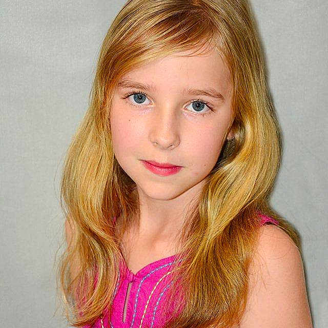 Ilona participe au concours pour gagner de l'argent avec cette photo :