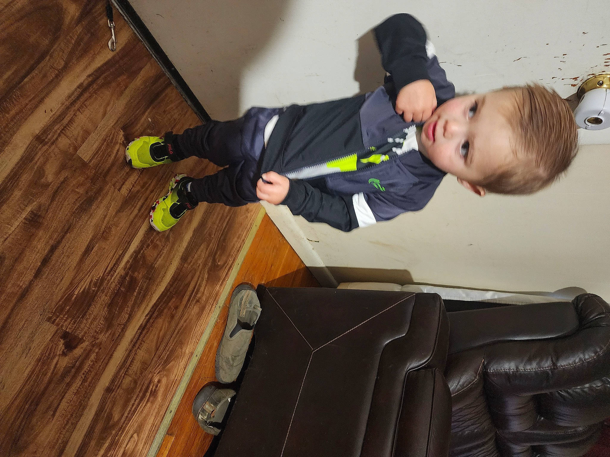 Brandon joined the competition — help win amazing prizes! baby_toddler_clothing, boot, child, comfort, floor, flooring, hardwood, knee, laminate_flooring, outdoor_shoe, person, shoe, sitting, sleeve, suit, toddler, varnish, walking_shoe, wood, wood_flooring