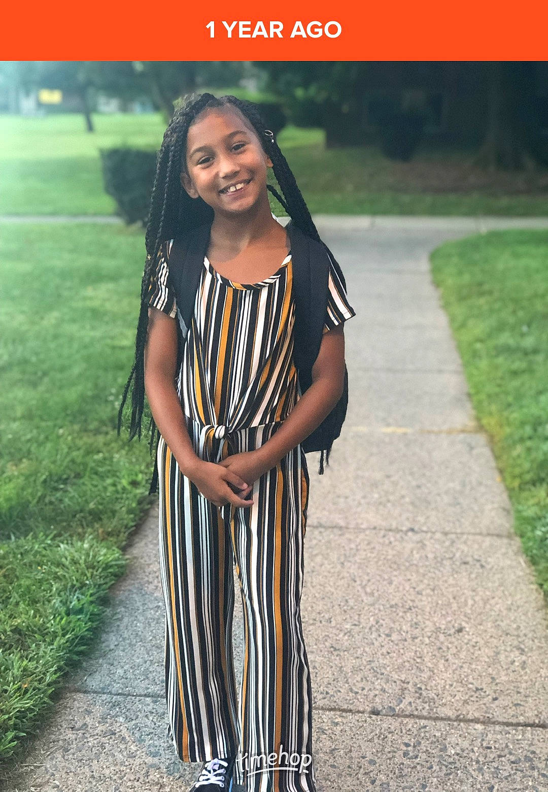 Brianna is registered to the contest to win money with this photo: asphalt, black_hair, day_dress, dress, electric_blue, eyewear, fashion_design, flash_photography, formal_wear, grass, happy, joy, long_hair, neck, one_piece_garment, pattern, person, sleeve, smile, street_fashion