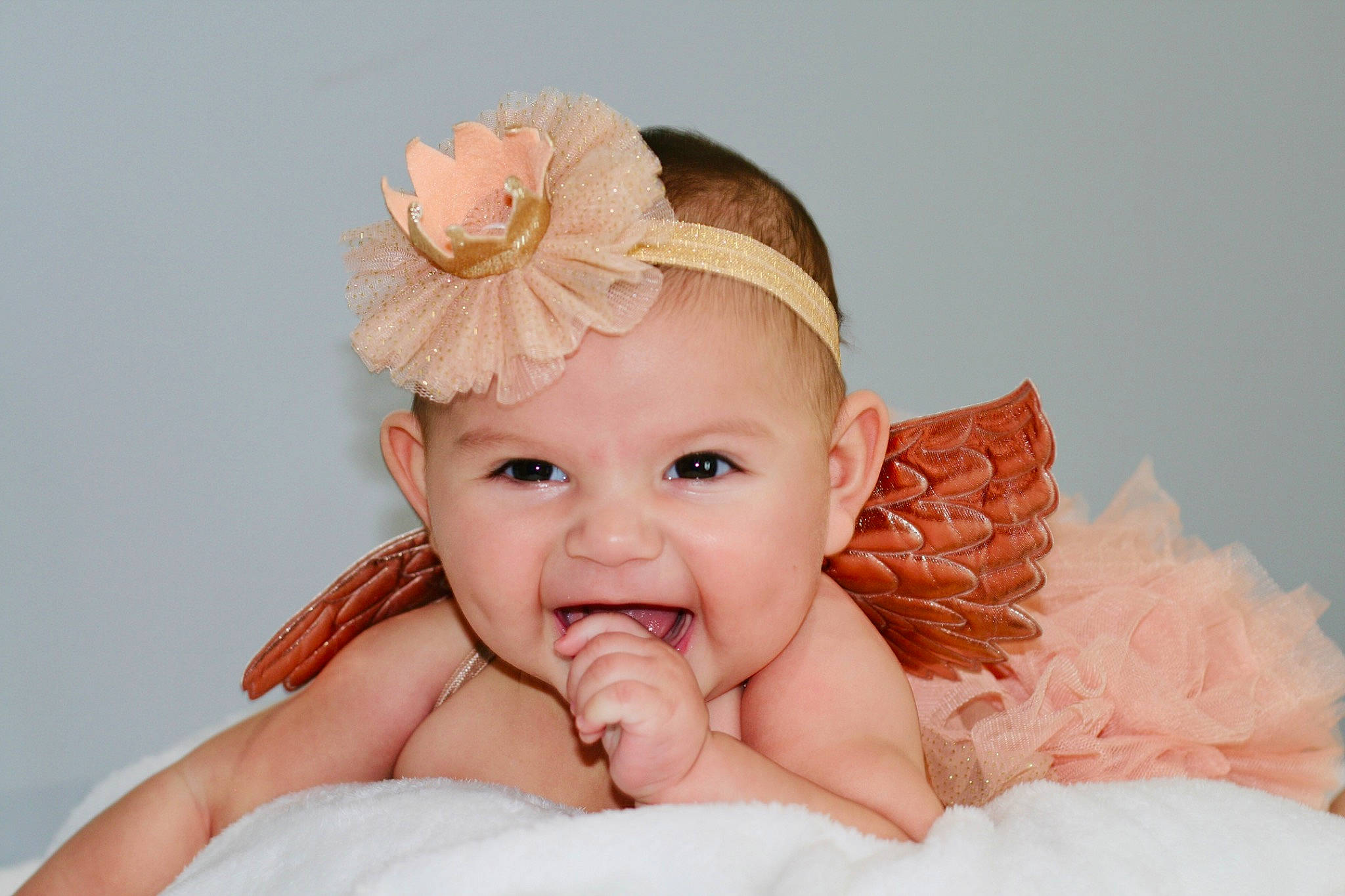 Melanie is registered to the contest to win money with this photo: arm, baby, baby_toddler_clothing, dress, ear, eye, eyebrow, eyelash, face, flash_photography, hair, hand, happy, head, human_body, iris, lip, person, skin, smile