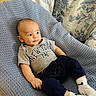 baby, child, infant, clothing, tshirt, pants, socks, chair, fabric, texture, pattern, floral, portrait, indoor, cute, smile, relaxed, person, cozy, new_york