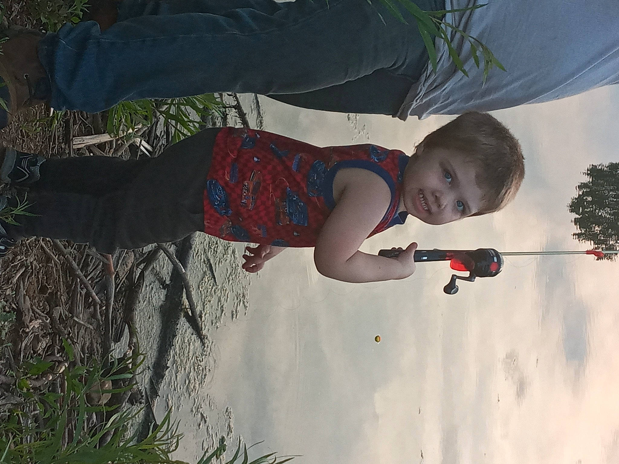 Chaz is registered to the contest to win money with this photo: child, cloud, elbow, fun, grass, grass_family, happy, leisure, pattern, people_in_nature, person, plant, play, recreation, shadow, sky, smile, sunglasses, tints_and_shades, toddler
