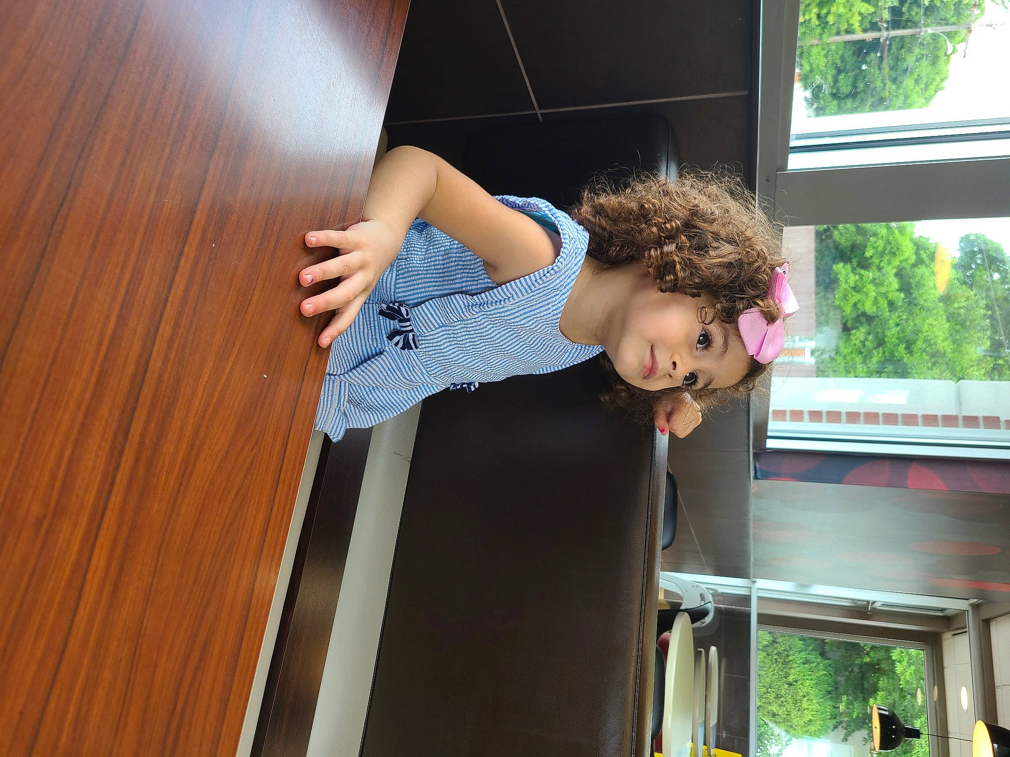 Carla joined the competition — help win amazing prizes! baby_toddler_clothing, child, elbow, flooring, fun, happy, hardwood, headwear, human_leg, knee, leisure, person, plant, room, stairs, t_shirt, toddler, tree, vacation, window