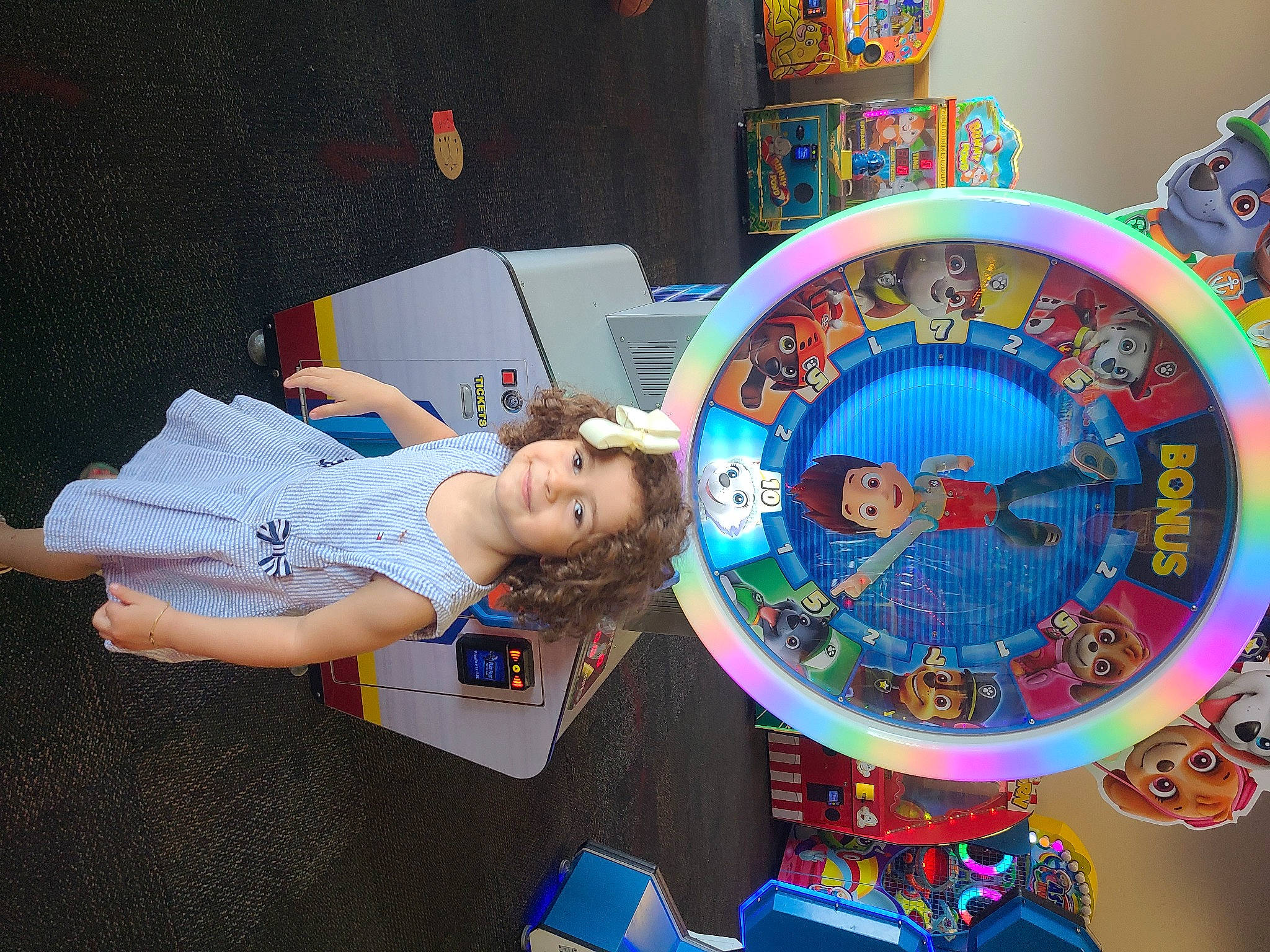 Melania joined the competition — help win amazing prizes! animated_cartoon, animation, art, child, circle, electric_blue, fictional_character, fun, games, home_accessories, joy, leisure, machine, person, play, recreation, room, space, toddler, toy