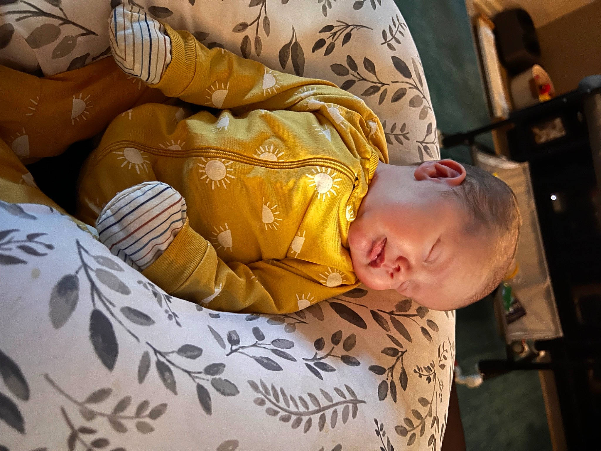 Adam is registered to the contest to win money with this photo: bed_sheet, bedding, bedtime, child, comfort, couch, elbow, flooring, human_leg, linens, nap, pattern, person, room, sitting, sleep, t_shirt, thigh, wood