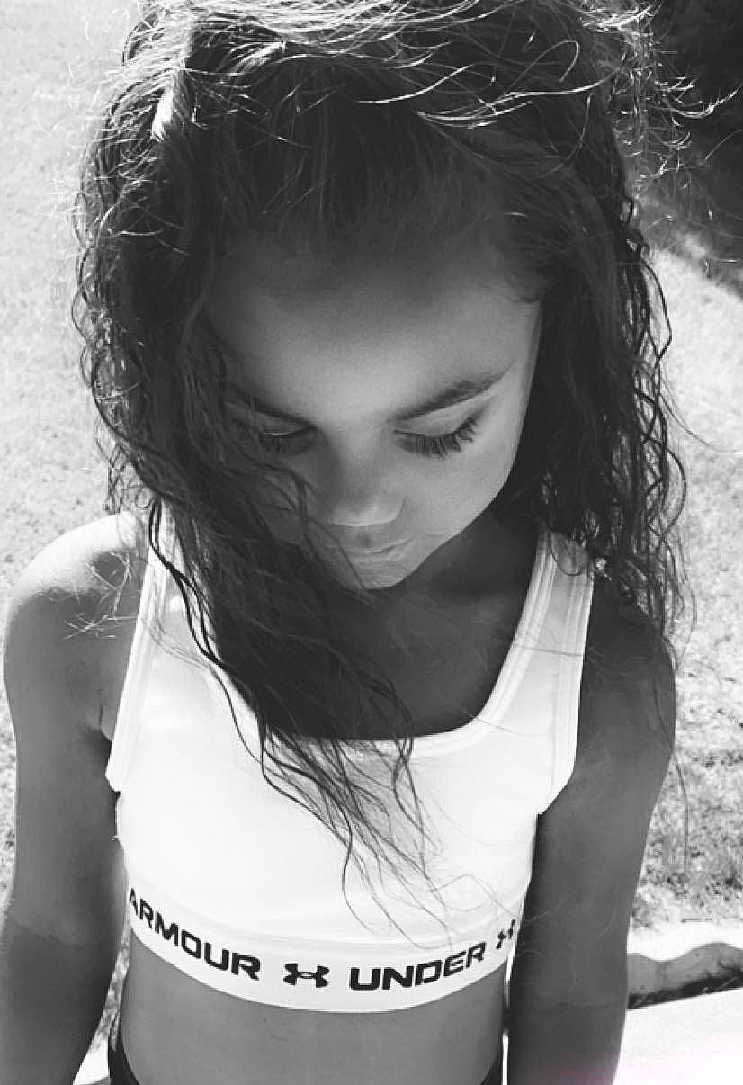 Brynlee is registered to the contest to win money with this photo: arm, black, chin, eye, eyebrow, eyelash, facial_expression, flash_photography, hair, hairstyle, hand, head, human_body, lip, mouth, organ, person, photograph, shoulder, skin