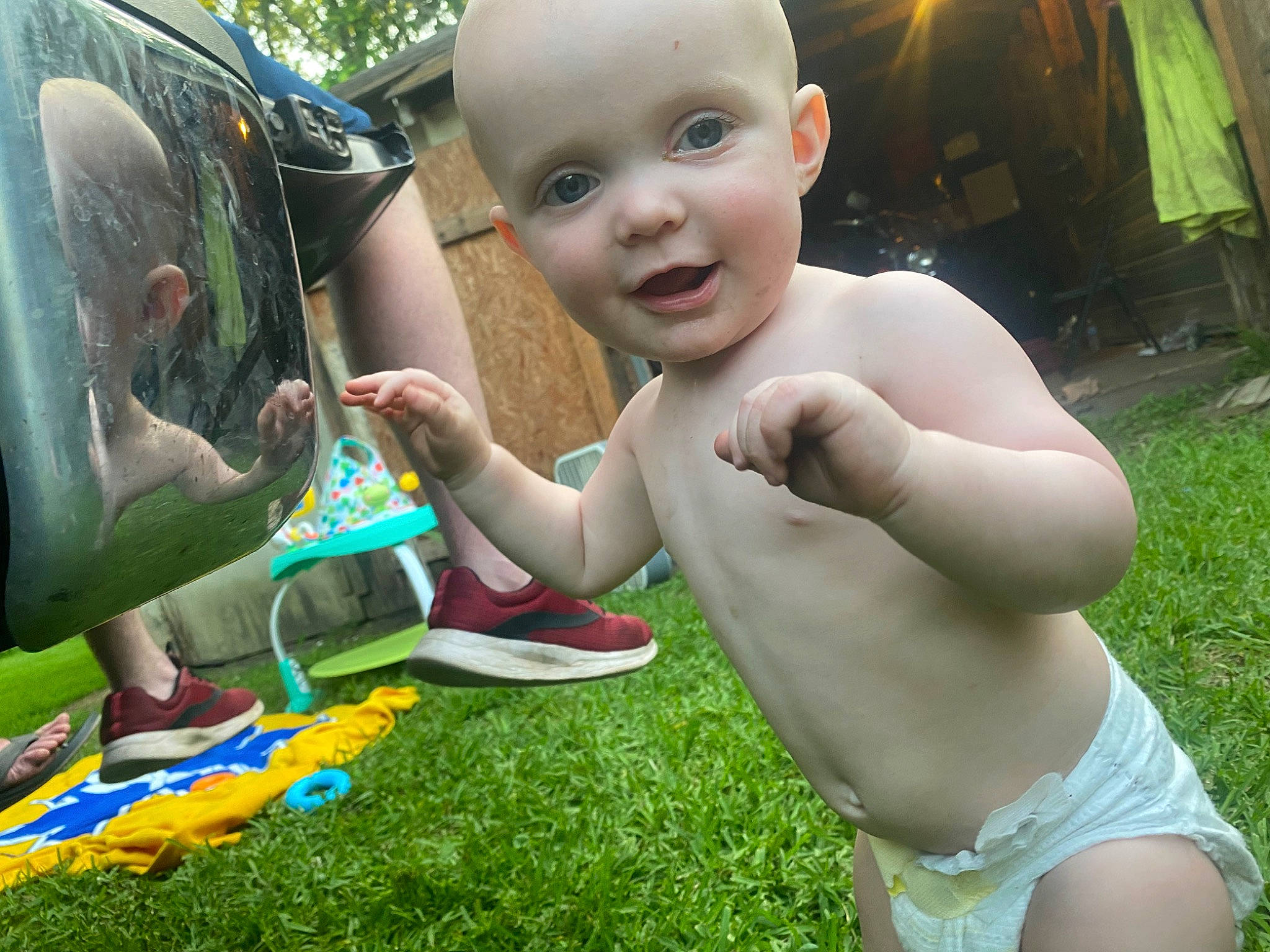 Austin joined the competition — help win amazing prizes! automotive_exterior, baby, bumper, chest, child, finger, fun, gesture, grass, green, happy, lawn, leisure, people_in_nature, person, smile, summer, thumb, toddler, toy