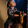 Enola a rejoint le concours — aidez-le/la à gagner de superbes lots ! child, girl, toy_horse, rocking_horse, rain, wet_hair, ribbon, plaid_dress, dark_tights, indoor, wooden_toy, smiling, closed_eyes, play, childhood, portrait, happy, water_drops, lighting, emotion