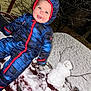 baby, blue, car, child, cold, cute, face, frost, hood, jacket, night, outdoor, playful, red, smile, snow, snowman, snowsuit, twig, winter