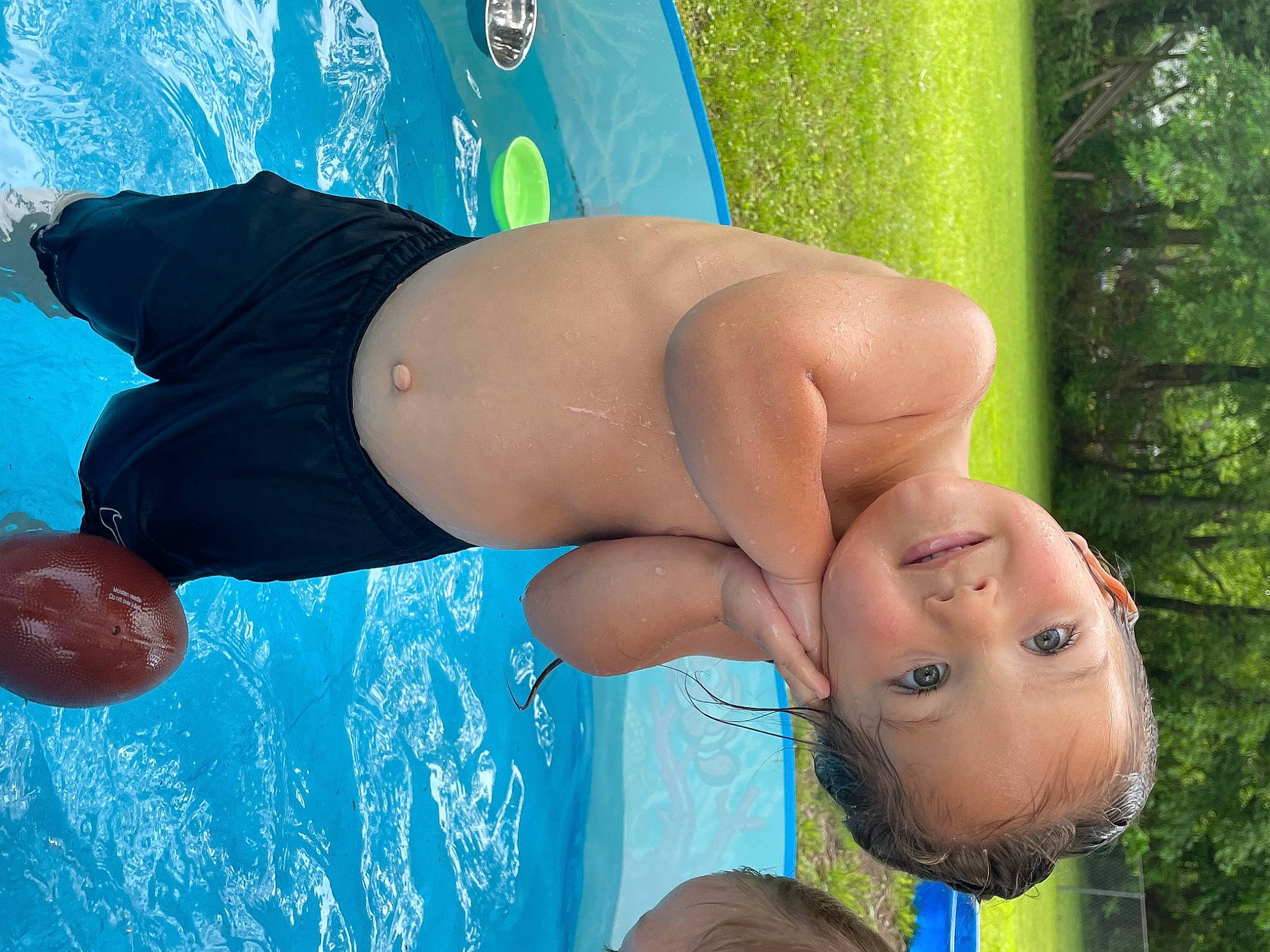 Eric is registered to the contest to win money with this photo: abdomen, arm, black_hair, chest, elbow, finger, fun, green, happy, human_body, joy, leg, leisure, muscle, people_in_nature, person, plant, summer, thigh, trunk