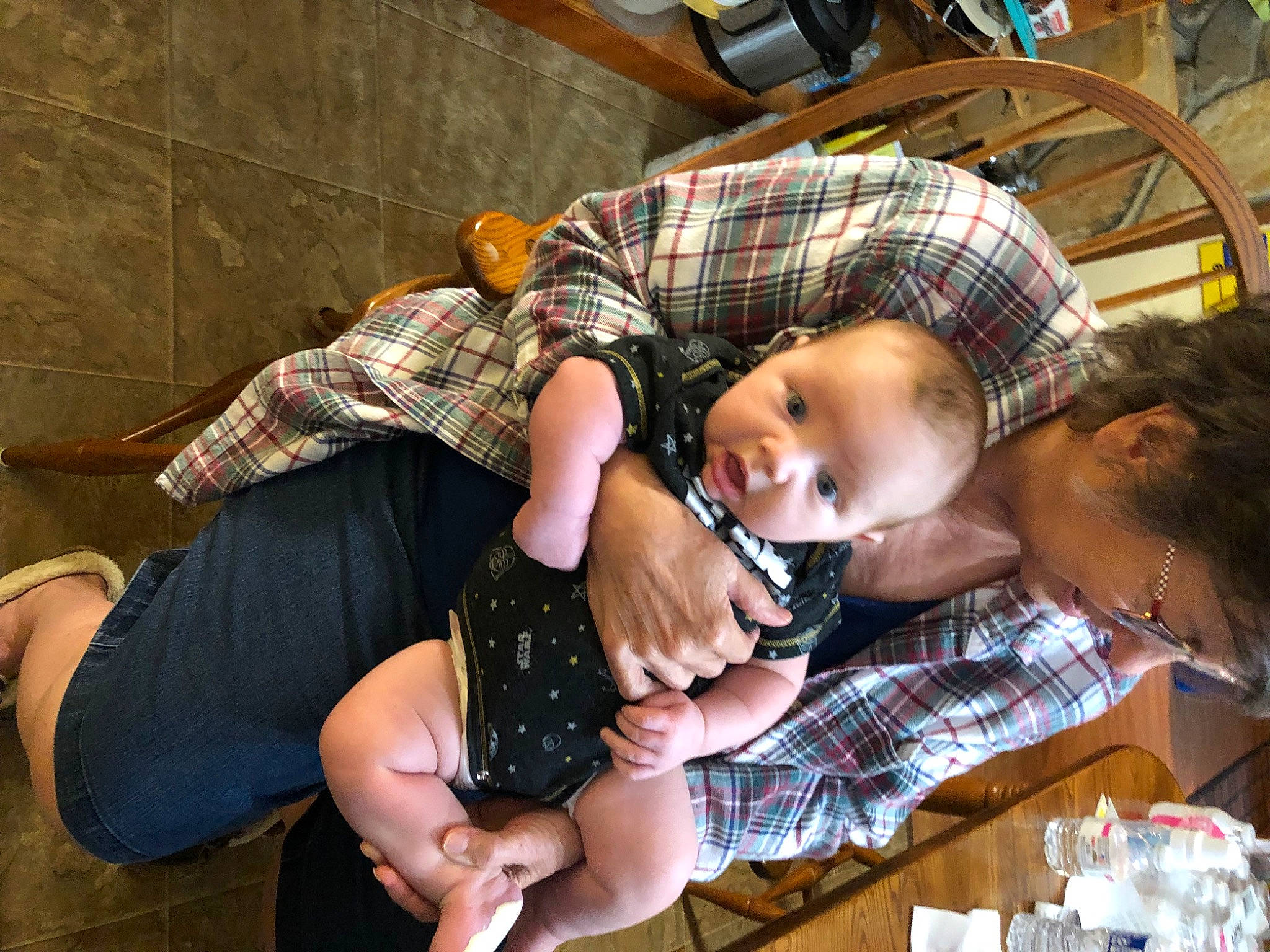 Ragnar joined the competition — help win amazing prizes! baby, black_hair, child, drinkware, event, foot, fun, happy, lap, mouth, nail, pattern, person, plaid, sitting, tableware, tartan, thigh, toddler, vacation