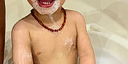 Diego a rejoint le concours — aidez-le/la à gagner de superbes lots ! toddler, bath, soap, bubbles, foam, child, happy, smiling, water, bathtub, skin, necklace, toy, wet, arms, head, face, teeth, playful, indoor