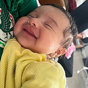 Cielo joined the competition — help win amazing prizes! baby, smile, face, infant, yellow_clothing, green_clothing, happy, closeup, person, child, cute, indoors, skin, head, expression, warm, young, portrait, human, cozy