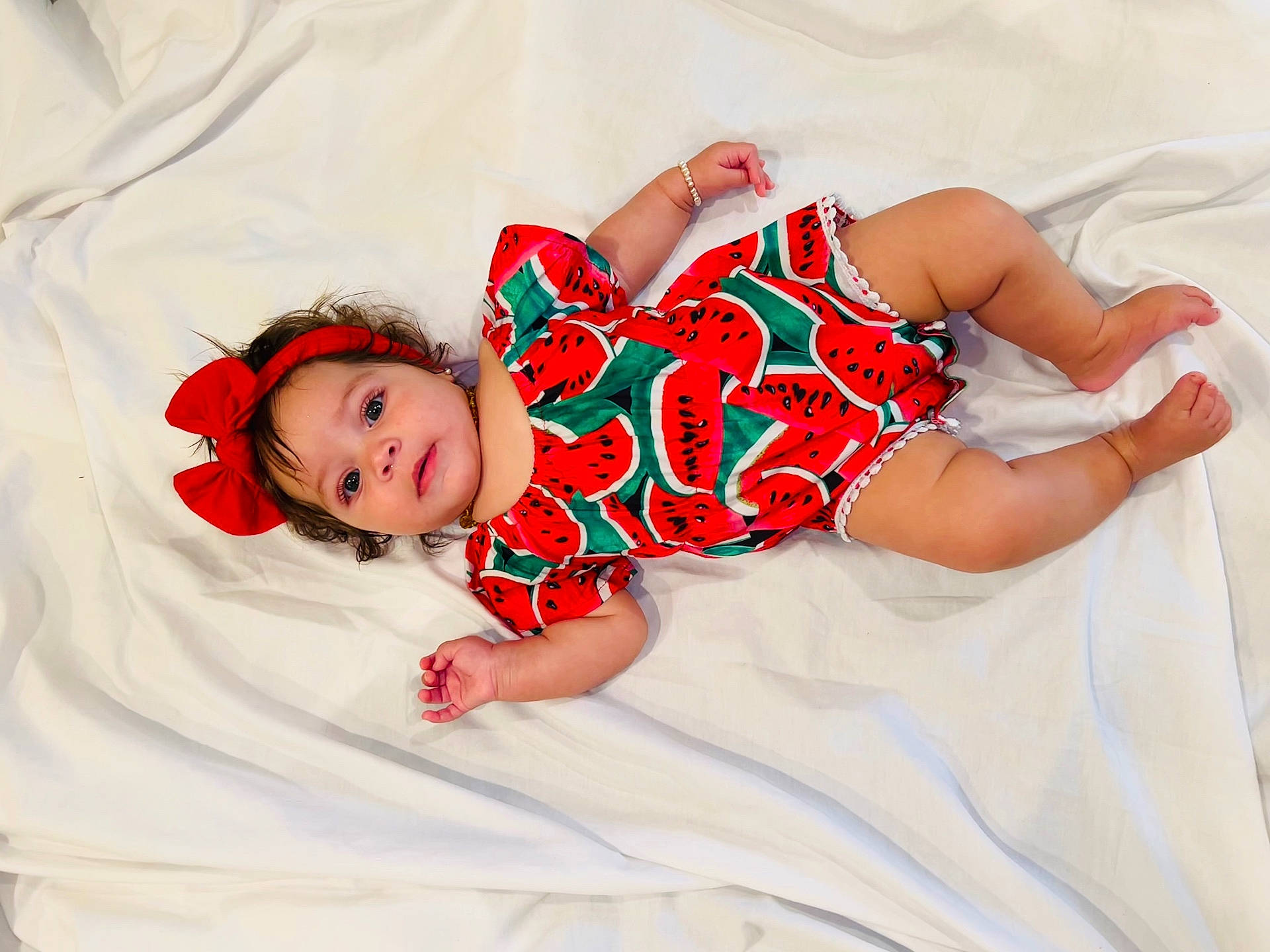 Luna Cattleya joined the competition — help win amazing prizes! baby, bed, blanket, bodypart, clothing, couch, dress, face, finger, furniture, hand, happy, hat, head, newborn, pattern, person, photography, portrait, shorts