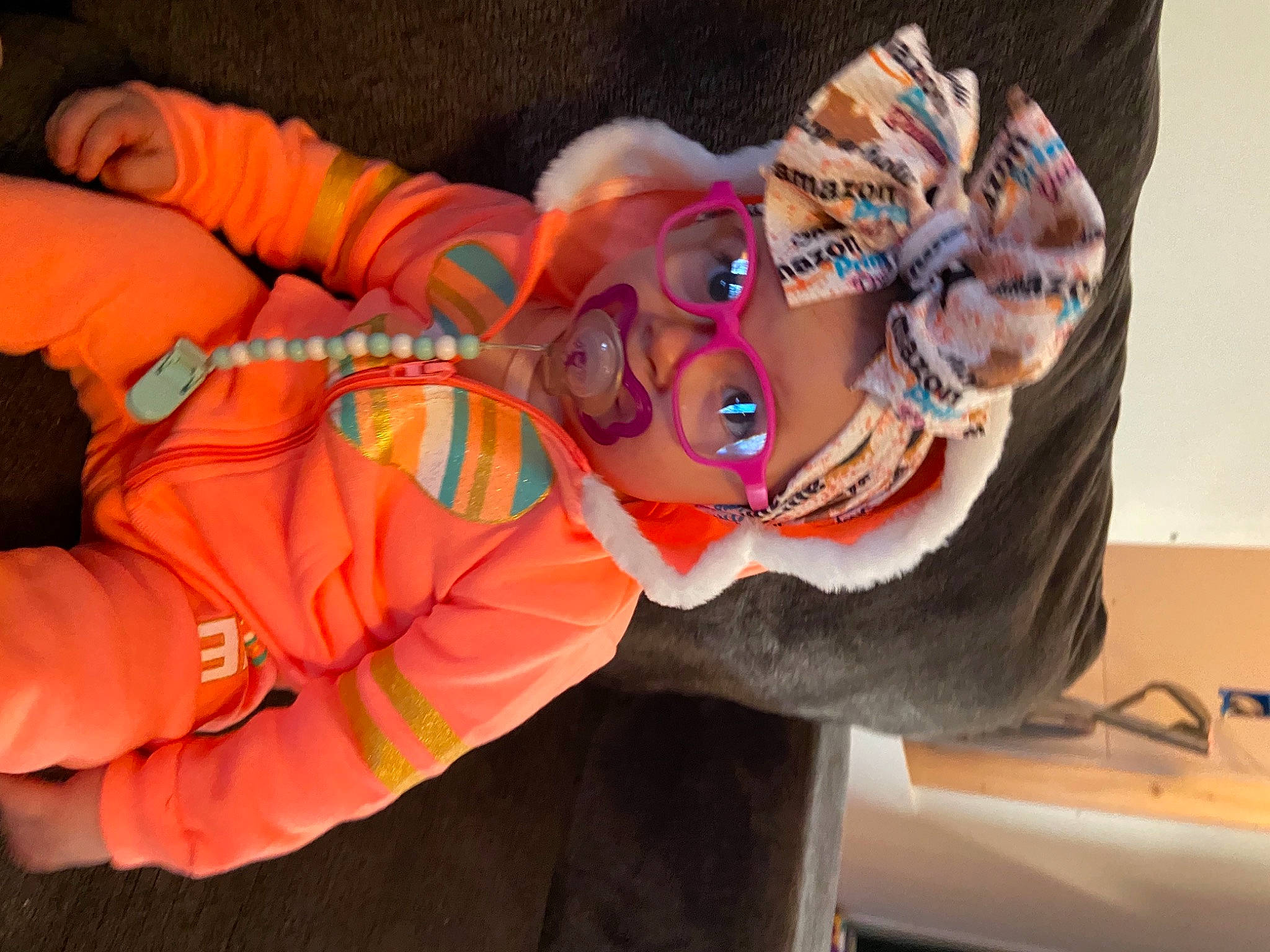Ivie joined the competition — help win amazing prizes! art, baby, child, costume, event, eyewear, fashion_accessory, fun, fur, orange, person, personal_protective_equipment, scarf, sunglasses, visual_arts, wrist