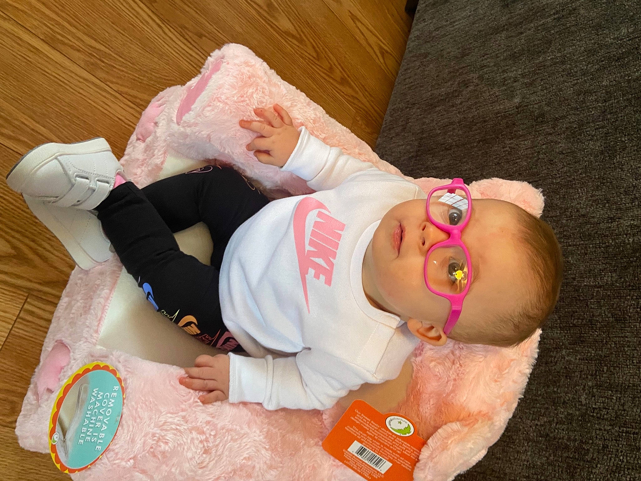 Ivie is registered to the contest to win money with this photo: abdomen, arm, baby, baby_toddler_clothing, chest, child, eye, face, facial_expression, hair_accessory, happy, head, headgear, human_body, human_leg, person, sunglasses, thigh, toddler, trunk