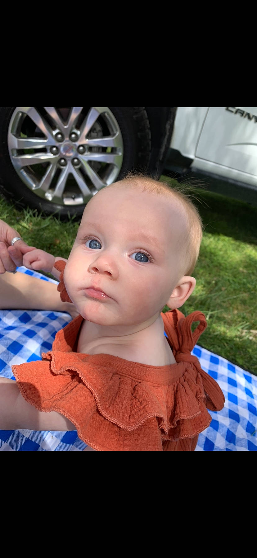 Norah Leomie is registered to the contest to win money with this photo: alloy_wheel, automotive_design, automotive_exterior, automotive_tire, automotive_wheel_system, baby, baby_toddler_clothing, electric_blue, event, fun, happy, iris, leisure, motor_vehicle, mouth, person, rim, skin, tire, toddler