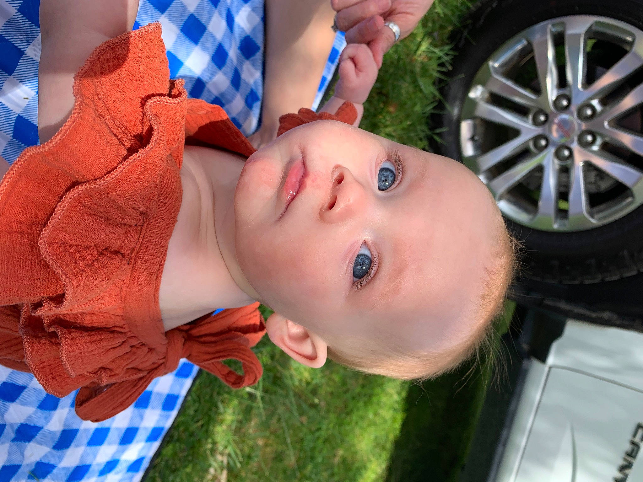 Norah Leomie joined the competition — help win amazing prizes! automotive_exterior, automotive_tire, baby, blue, chair, electric_blue, eyelash, flash_photography, fun, grass, happy, leisure, motor_vehicle, mouth, nose, person, rim, skin, tire, toddler