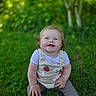 baby, blue_eyes, casual, child, clothing, cute, daylight, flowers, grass, greenery, happy, infant, nature, outdoor, portrait, sitting, smiling, strawberry, sunlight, toddler