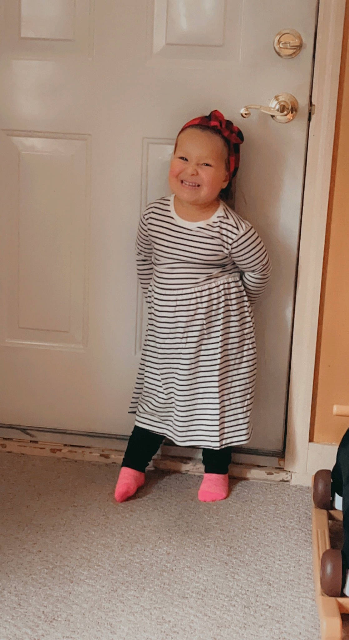 Olivia joined the competition — help win amazing prizes! baby_toddler_clothing, barefoot, child, door, fashion_design, flooring, fun, hardwood, human_leg, joy, knee, magenta, pattern, person, play, room, shoulder, sleeve, smile, sock