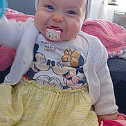 Jade participe au concours pour gagner de l'argent avec cette photo : baby, child, pacifier, headband, bow, smile, happy, toy, blanket, pillow, lion, clothing, cardigan, skirt, shirt, indoor, cute, person, infant, portrait