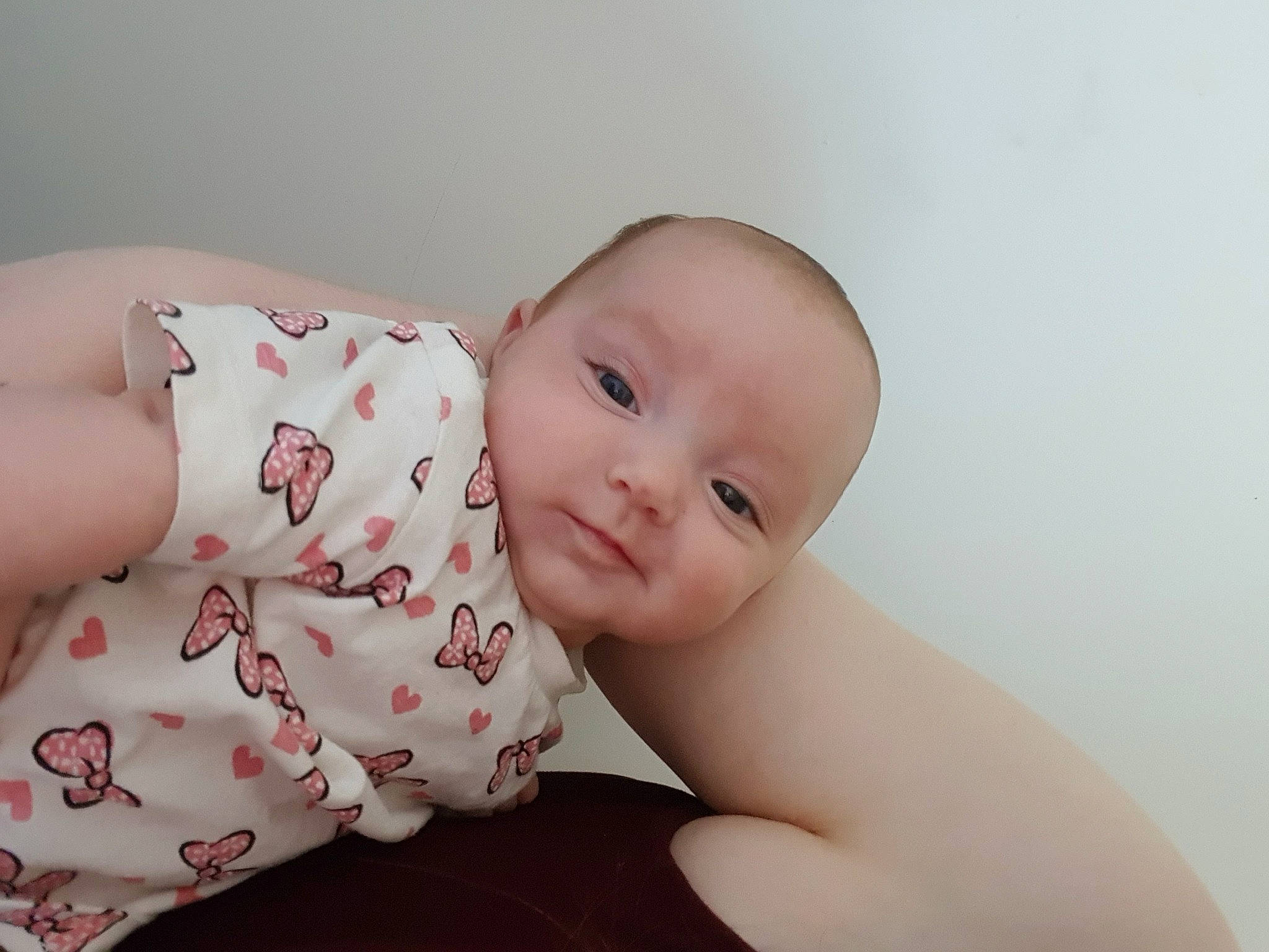 Annabella joined the competition — help win amazing prizes! baby, baby_toddler_clothing, cheek, comfort, elbow, eye, flash_photography, happy, human_body, human_leg, iris, linens, lip, neck, pattern, person, sitting, sleeve, smile, stomach