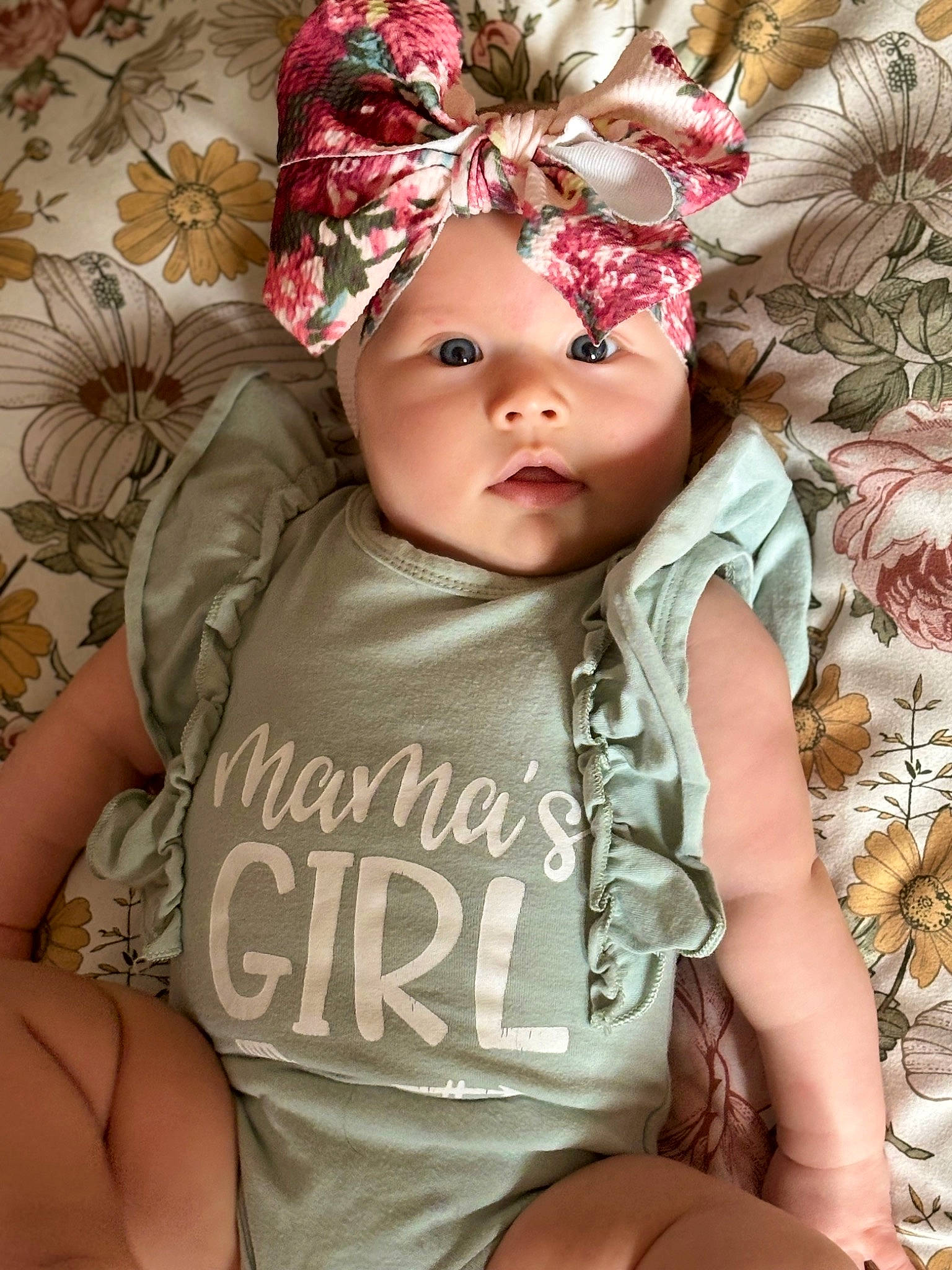 Adaline joined the competition — help win amazing prizes! baby, baby_products, baby_toddler_clothing, cap, child, dress, face, fashion_accessory, grass, happy, headgear, headwear, pattern, person, pink, product, sitting, skin, sleeve, textile