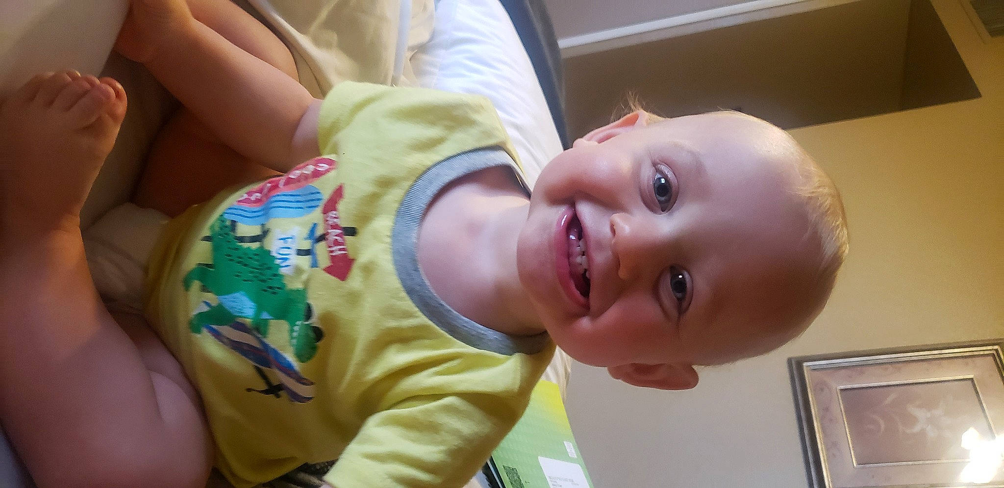 Jace is registered to the contest to win money with this photo: baby, baby_laughing, baby_toddler_clothing, cheek, chin, ear, eyebrow, finger, happy, human_body, iris, joy, lip, mouth, neck, nose, person, product, skin, sleeve