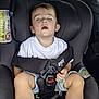 Gabriel a rejoint le concours — aidez-le/la à gagner de superbes lots ! toddler, child, car_seat, sleeping, car_interior, seatbelt, casual_clothing, shorts, white_shirt, sneakers, nap, young_child, safety_harness, relaxed, closed_eyes, indoors, seat, resting, cute, car_trip