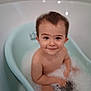 Gabriel participe au concours pour gagner de l'argent avec cette photo : toddler, child, bath, bathtub, bubbles, foam, water, smile, happy, skin, face, head, hair, arm, hand, sitting, indoor, cute, baby, play