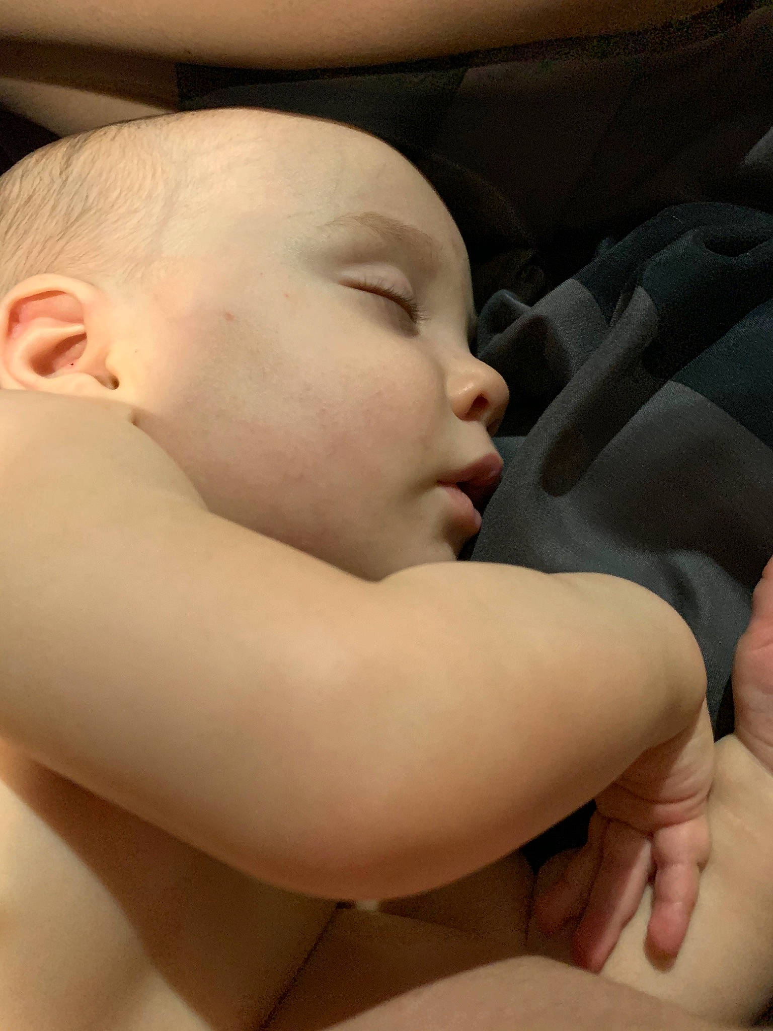 Robin is registered to the contest to win money with this photo: arm, baby, cheek, child, chin, face, finger, hand, head, lip, mouth, muscle, nail, nap, neck, nose, person, skin, sleep, thumb