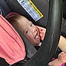Bristlynn Miller joined the competition — help win amazing prizes! automobile, baby, car_seat, child, eyes, face, finger, hair, hand, indoor, infant, lying_down, open_mouth, pink_blanket, playful, portrait, safety_label, sitting, smiling, tongue
